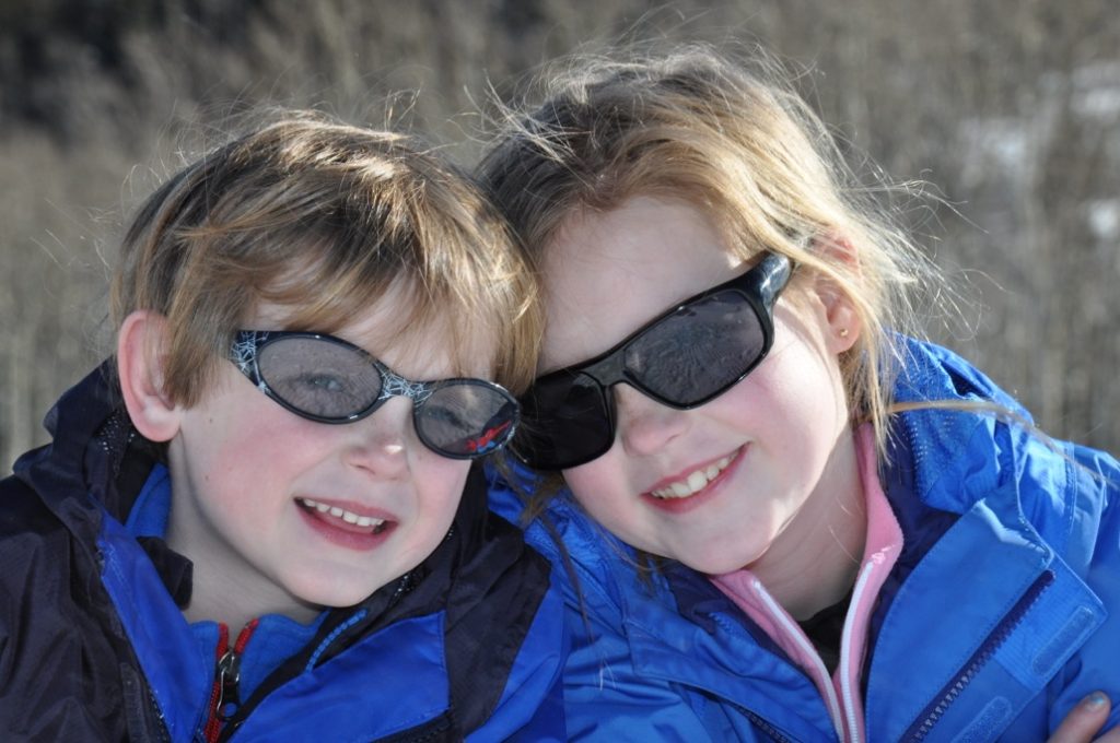 kids-in-ski-clothes-sunglasses