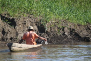 Local fisherman in canoe 