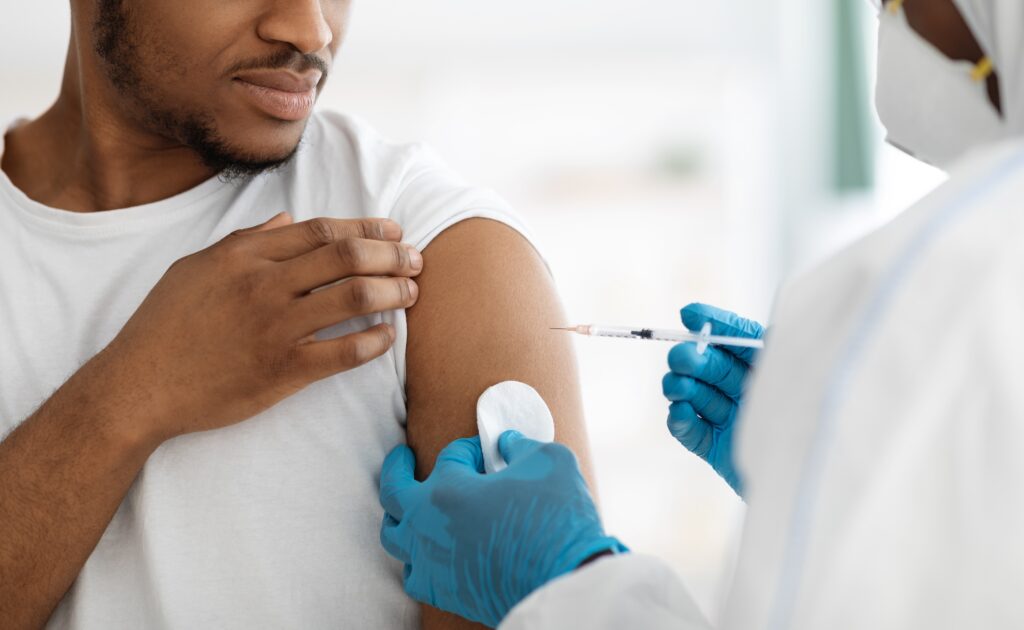 man receiving vaccine shot
